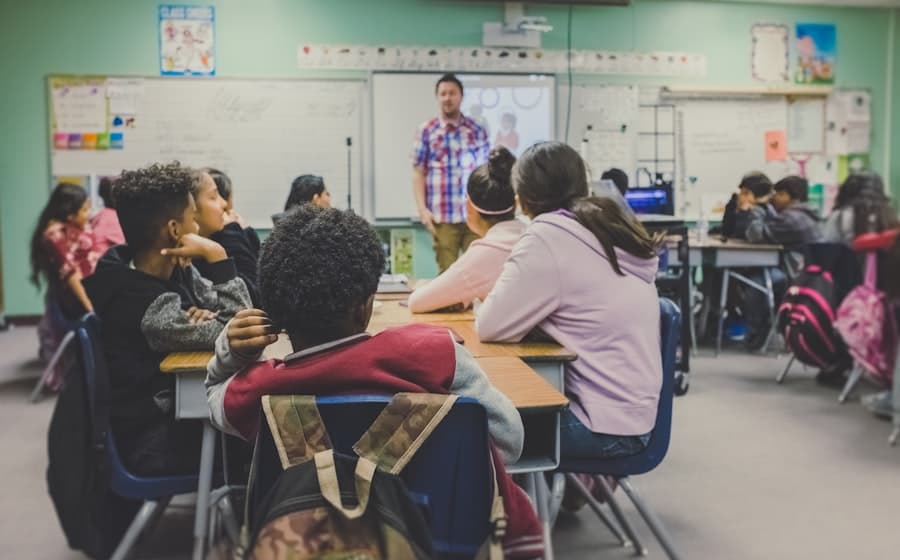 Students using digital learning technology in a modern classroom