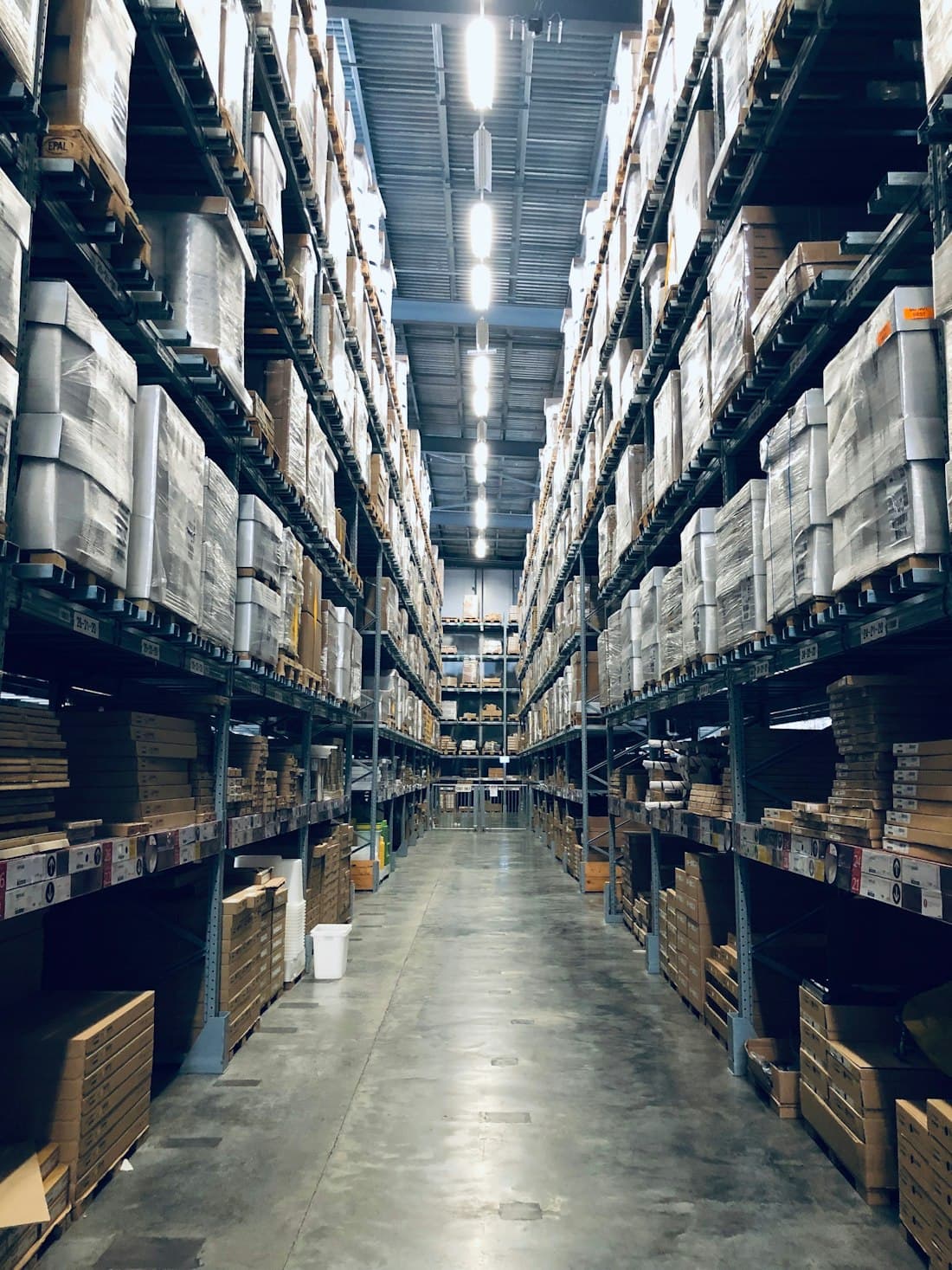 Refrigerated logistics vehicles at a cold storage facility