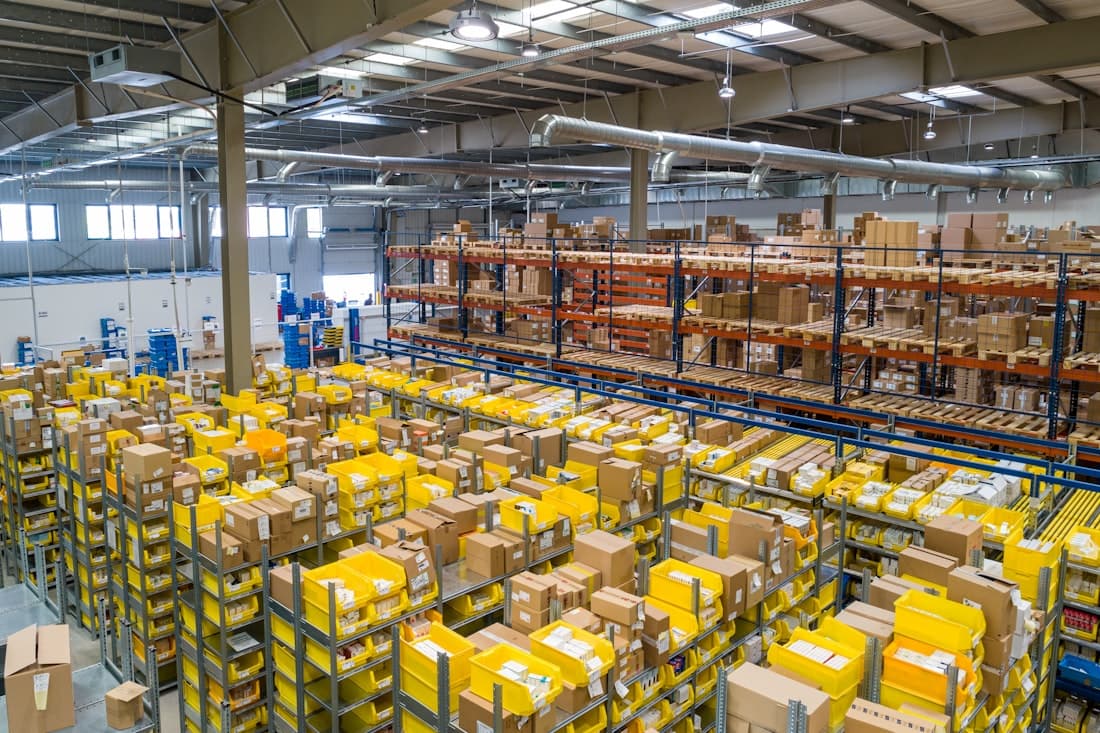 Automated warehouse sorting system with machine vision scanners