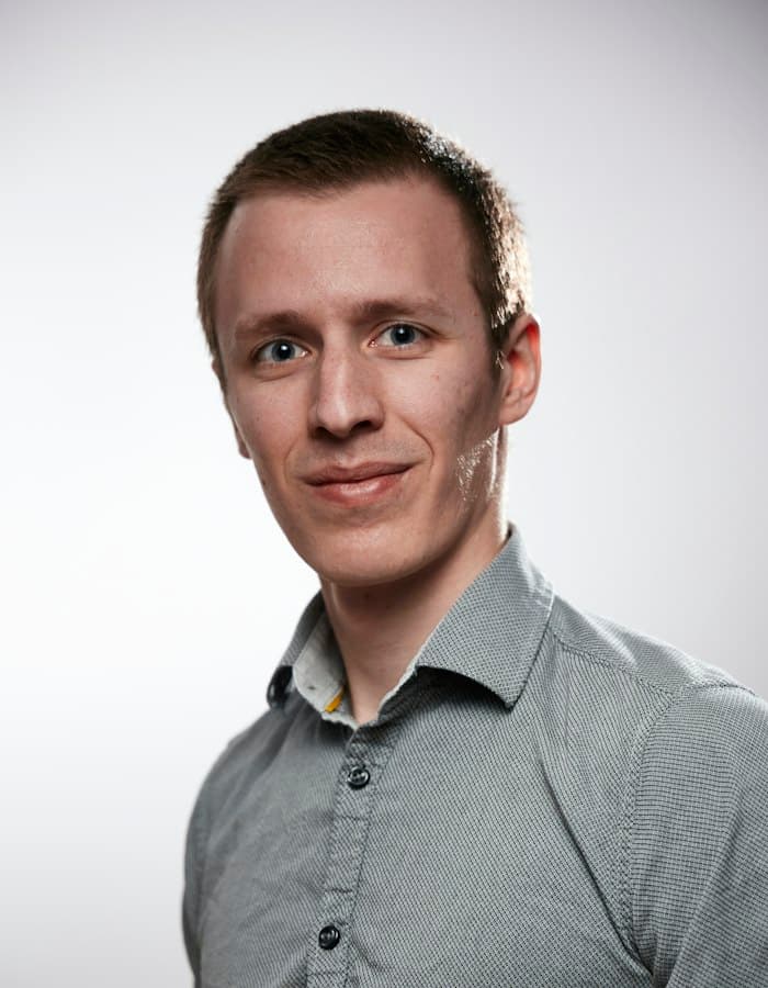 Portrait of Andrew Callahan, Head of AI and Data